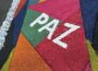 “Paz” – Sawdust and flower carpet on a street in Cartago, Costa Rica